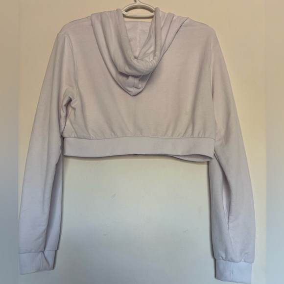 Brand is refuge athletics. Size L. Color is white. - Picture 2 of 2